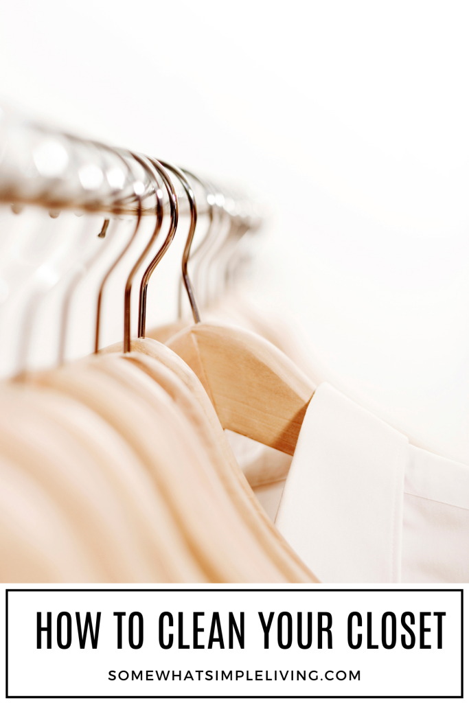 long image of wood hangers hanging in a closet