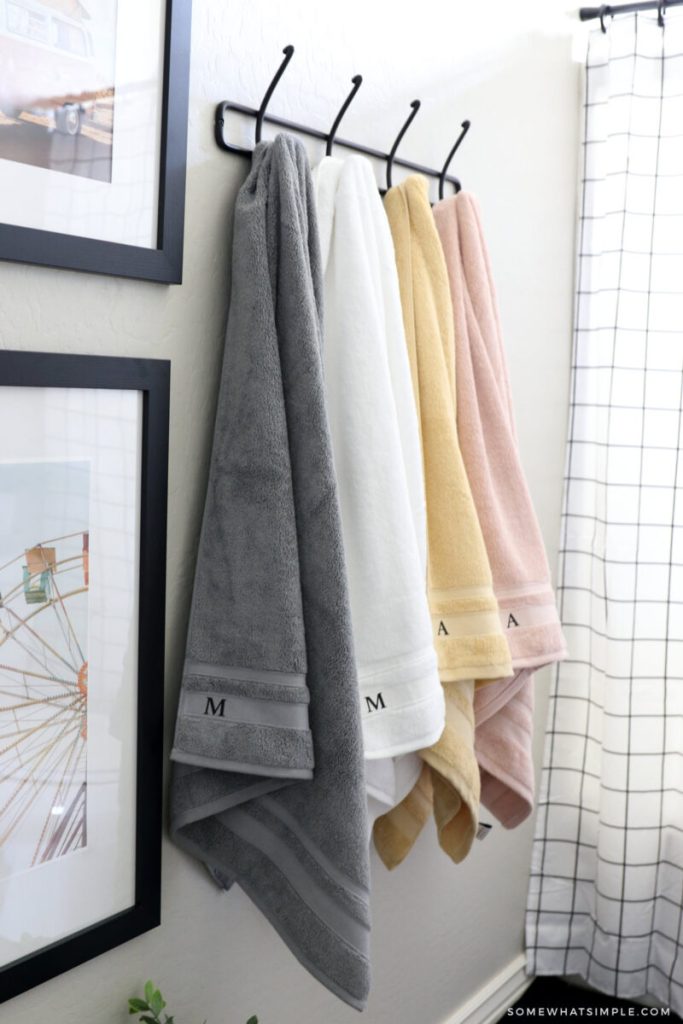 towels hanging in a kid's bathroom 