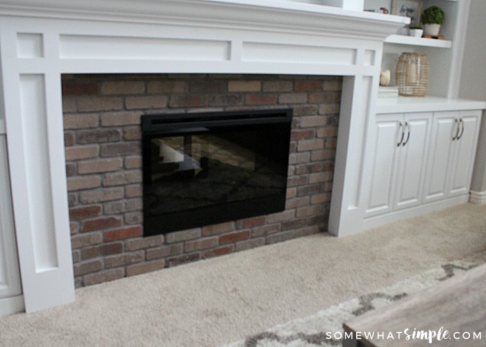 fireplace with brick surround