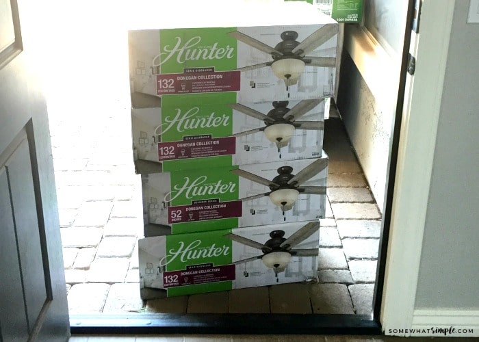 delivery of ceiling fans on a front porch