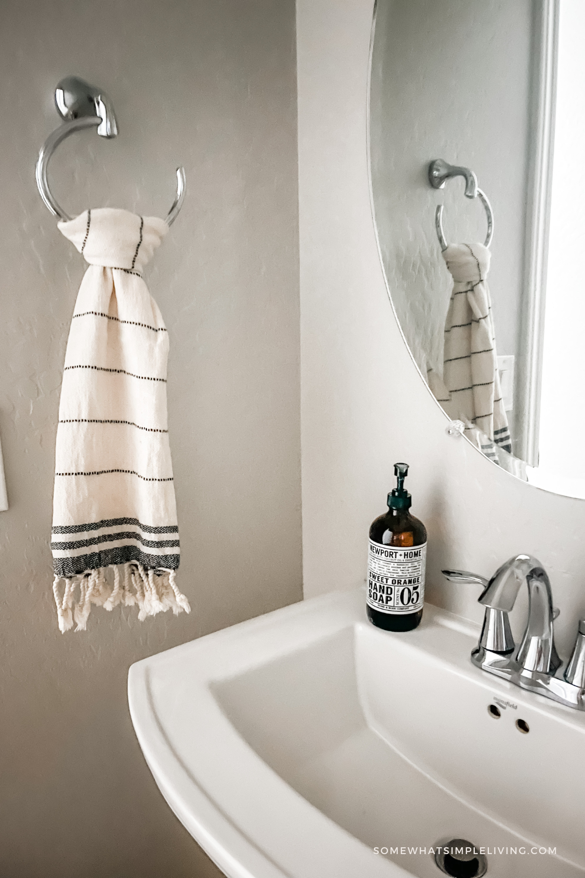 hanging hand towel in a powder room