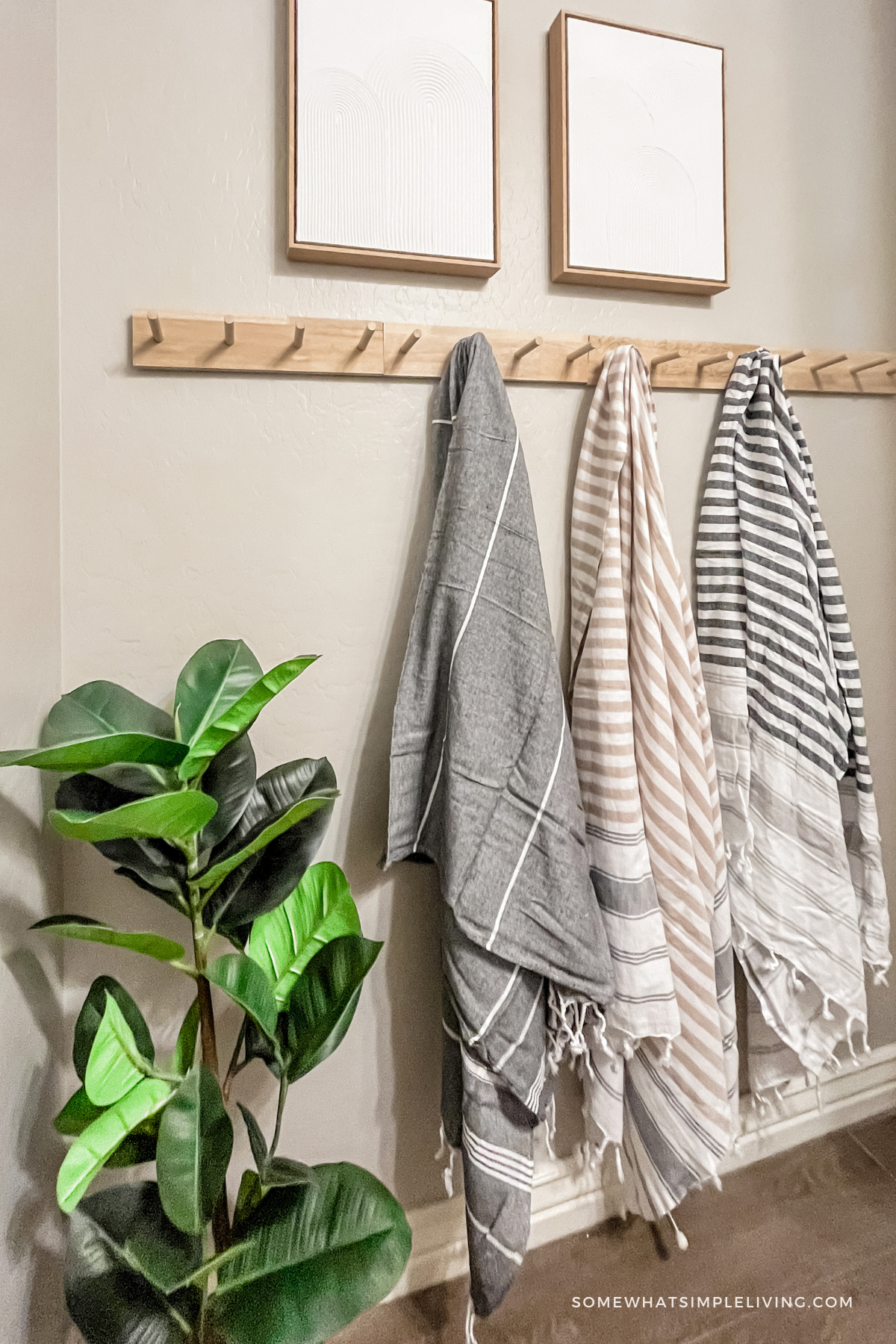 close up of hanging towels in a small bathroom