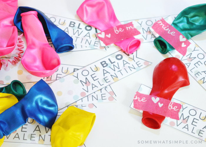 balloons taped to valentine tags that say "you blow me away"