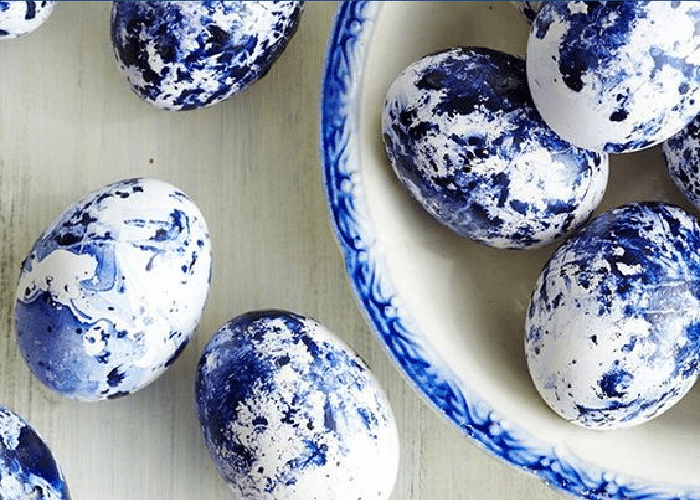 indigo dyed easter eggs in a bowl