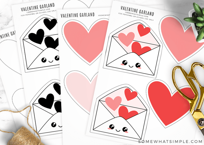 printable hearts printed on paper next to scissors