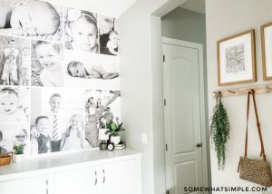 entry way with wall featuring a black and white photo collage