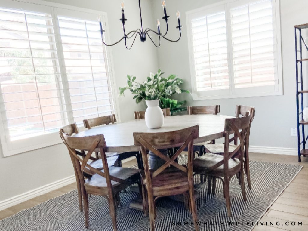 finished dining room with round wood table