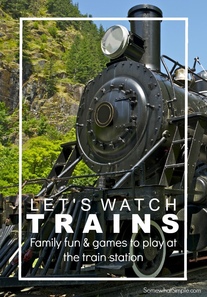 long image of black locomotive with text overlay on the top saying "let's watch trains"