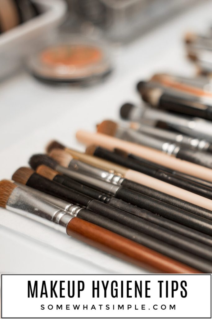 makeup brushes lined on the counter