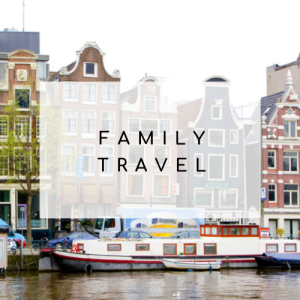 shot of amsterdam canal with a label that says Family Travel over the top