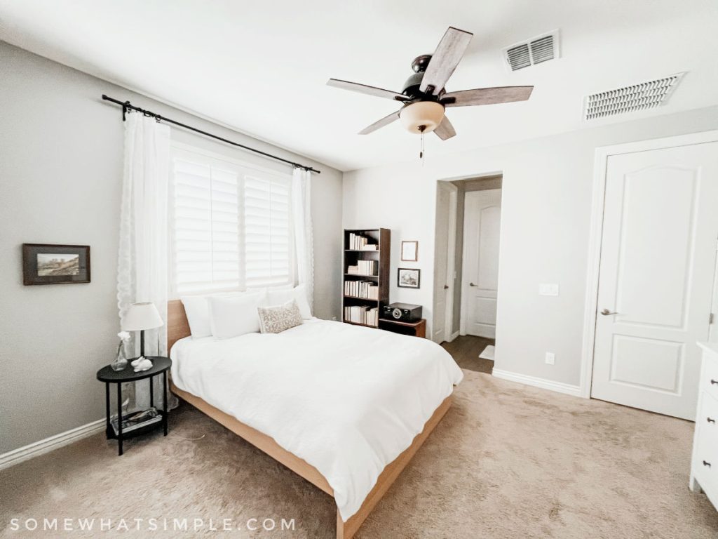 teen bedroom showing a bed and bookshelf in the background