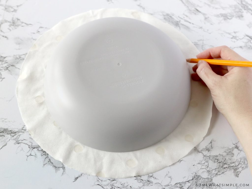 tracing a bowl onto fabric