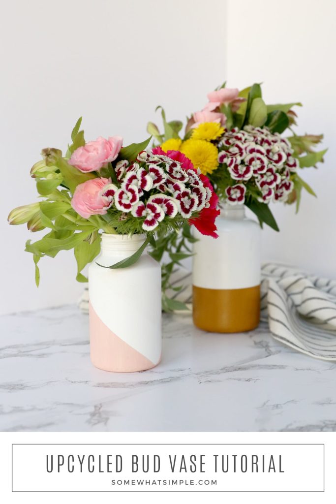 long image of pill bottles painted and made into flower vases