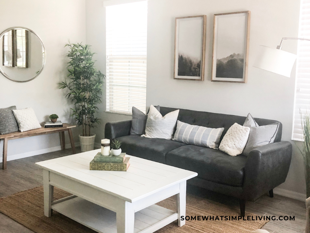 modern farmhouse living room with gray couch and white coffee table