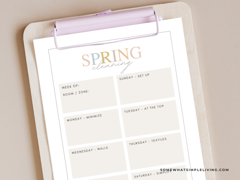 spring cleaning checklist on a pink clipboard