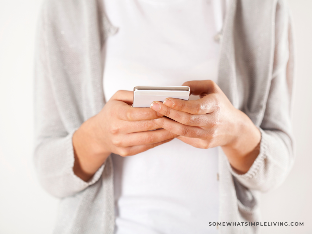 woman holding phone