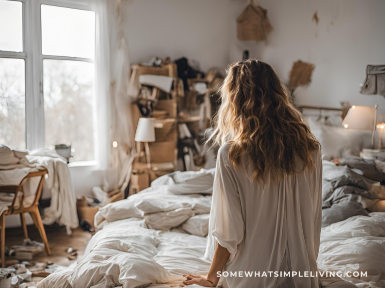 women overwhelmed with the mess in her room