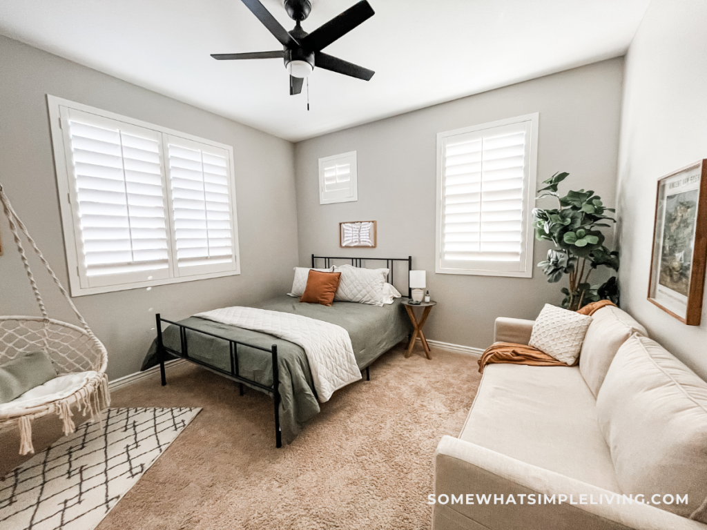 full shot of a clean and simple guest room