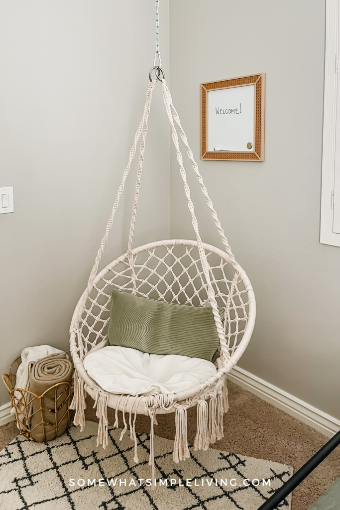 hammock chair in the corner of a guest room