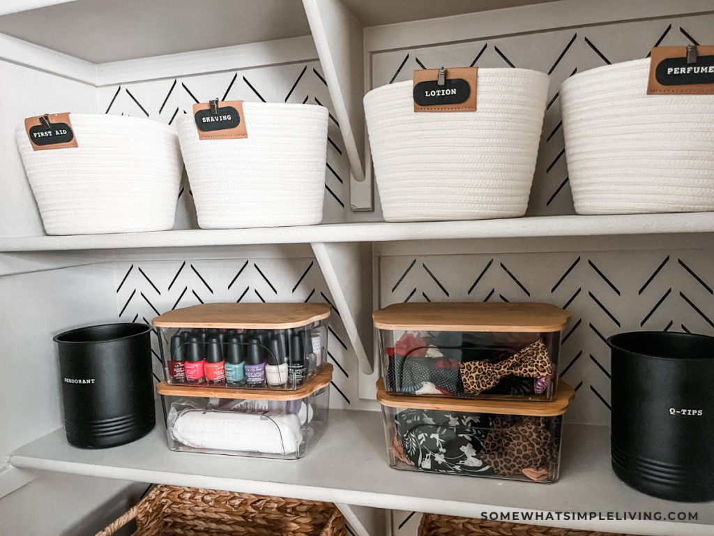 rope baskets and clear acrylic bins for bathroom toiletries