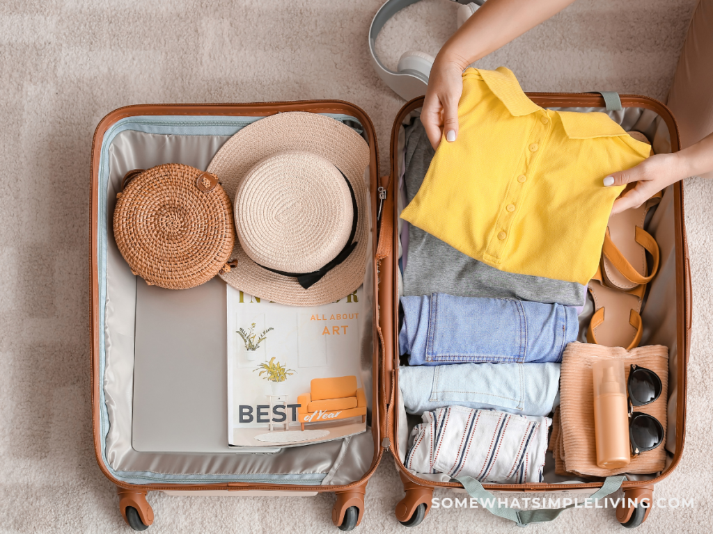 open suitcase with vacation clothing inside