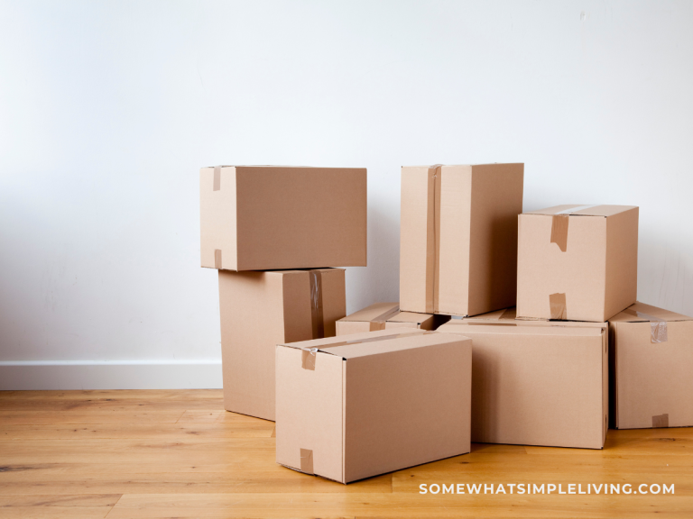 brown moving boxes stacked on the floor