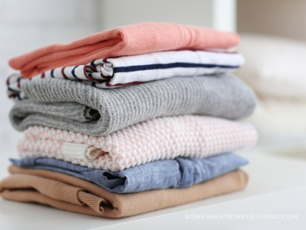 stack of maternity clothes