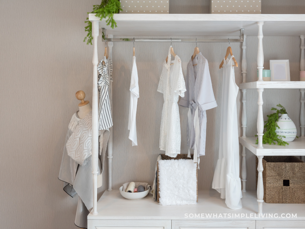 natural-colored clothes hanging in a wardrobe