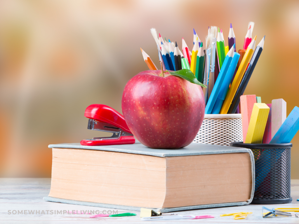 school supplies stacked on a table