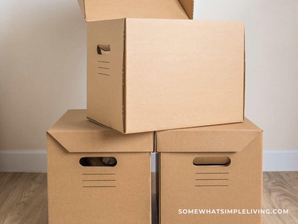 3 brown boxes used to declutter a space