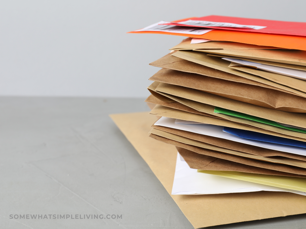 stack of junk mail on the counter