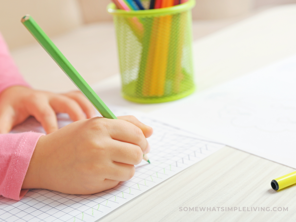 childs hand drawing on a piece of white paper